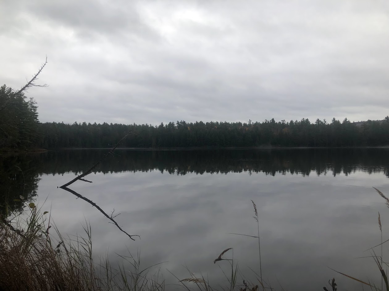 The calm glassy lake in the morning.